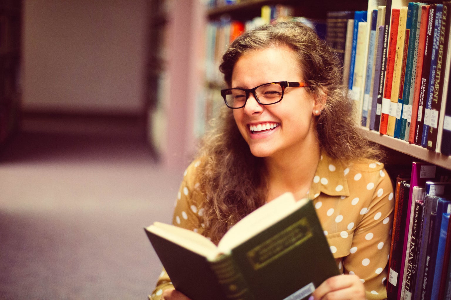 Girl With Glasses Reading Book