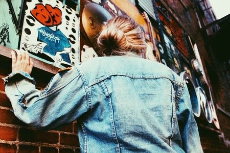 Amelia Kramer-Jean Jacket Bricks Sock Bun Mural Angle