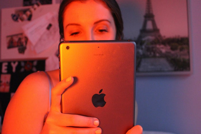 Anna Schultz girl holding ipad in bed?width=698&height=466&fit=crop&auto=webp