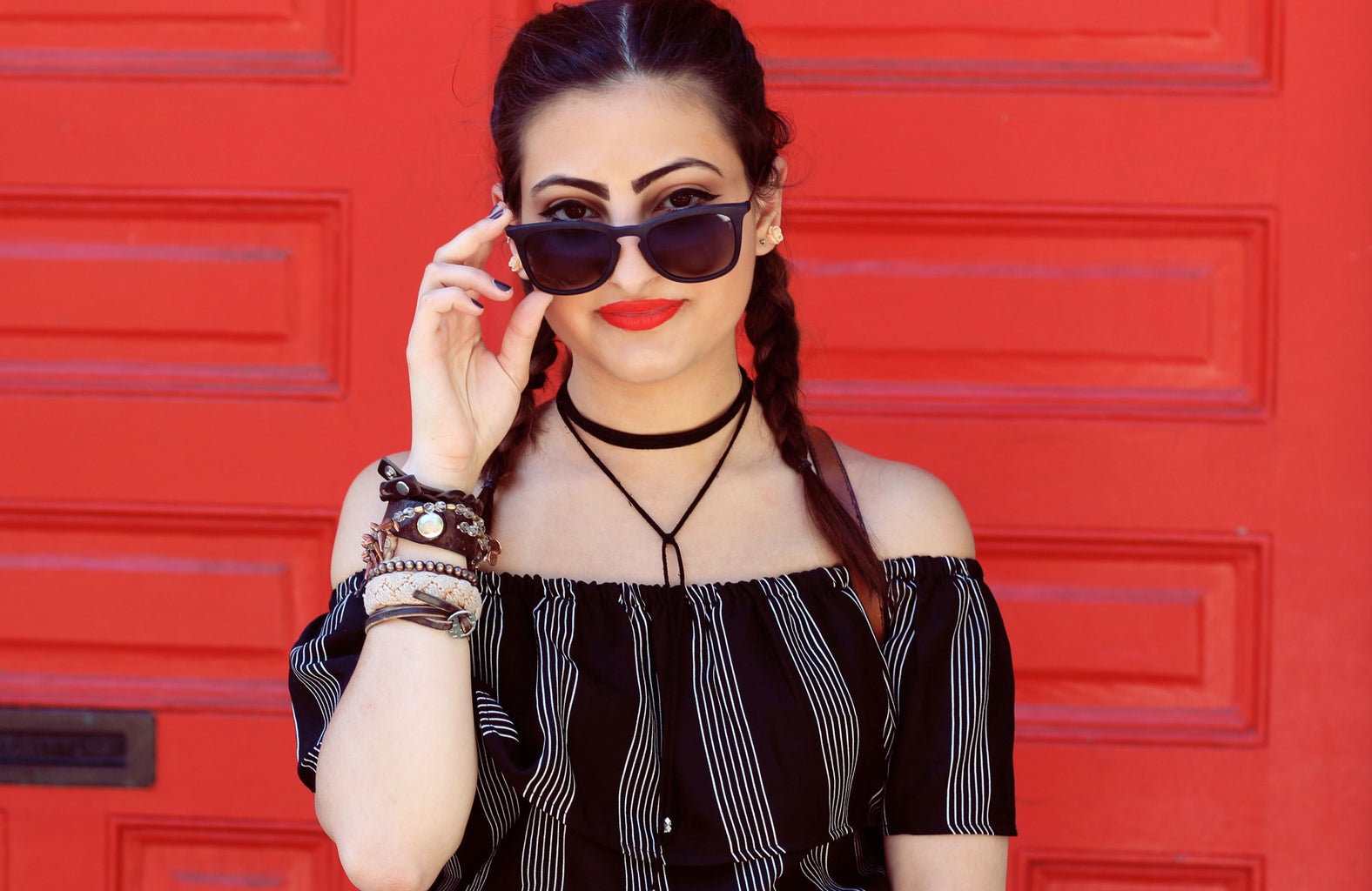 Girl With Sunglasses With Red Wall