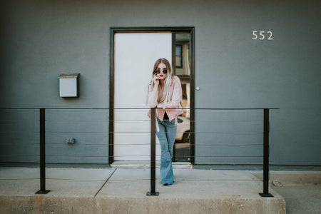 Girl In Front Of Apartment
