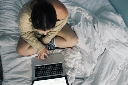 Anna Schultz-Girl Using Laptop On Bed