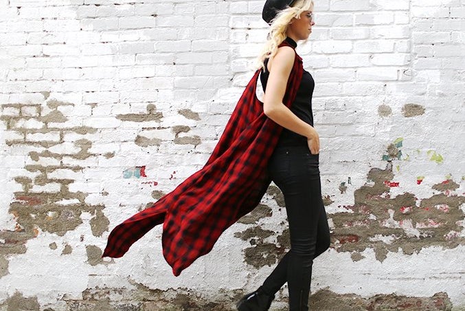 the lala plaid duster brick wall girl walking?width=698&height=466&fit=crop&auto=webp