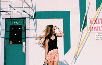 Anna Schultz-Windblown Hair In Front Of Cool Wall