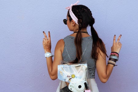 Girl With Peace Pigtails Sign Back