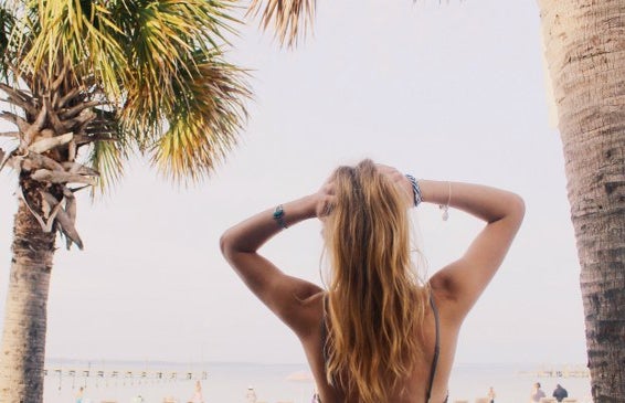 Anna Schultz girl with hands in hair on beach inspirational?width=719&height=464&fit=crop&auto=webp