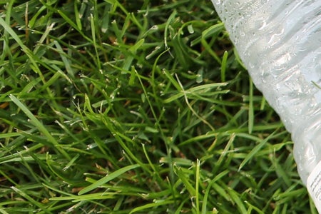 Tennis Shoes And Water Bottle
