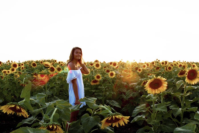 Maria Scheller girl white dress sunflower field summer?width=698&height=466&fit=crop&auto=webp
