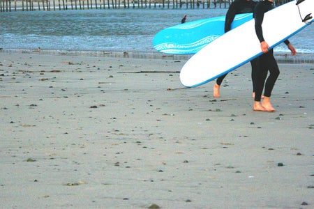 The Lalatwo Surfers With Surf Boards