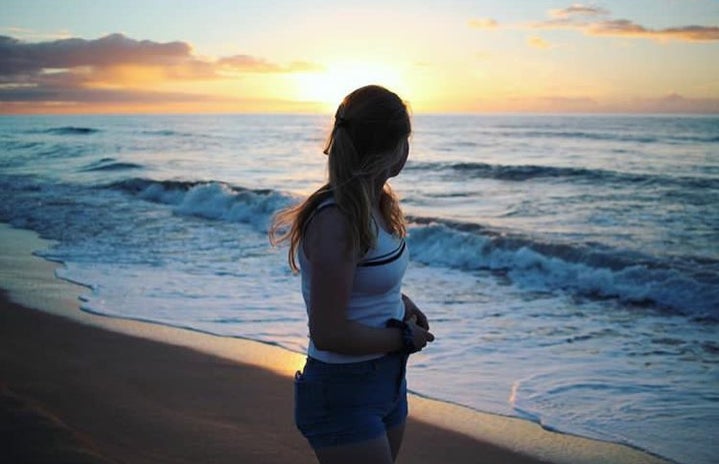 charlotte reader sunset beach girl ocean water sky nature peaceful?width=719&height=464&fit=crop&auto=webp