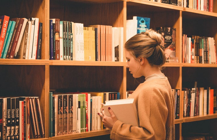 woman in library by Eliabe Costa on Unsplash?width=719&height=464&fit=crop&auto=webp