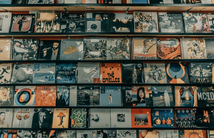 vinyl records on wall by Unsplash?width=719&height=464&fit=crop&auto=webp