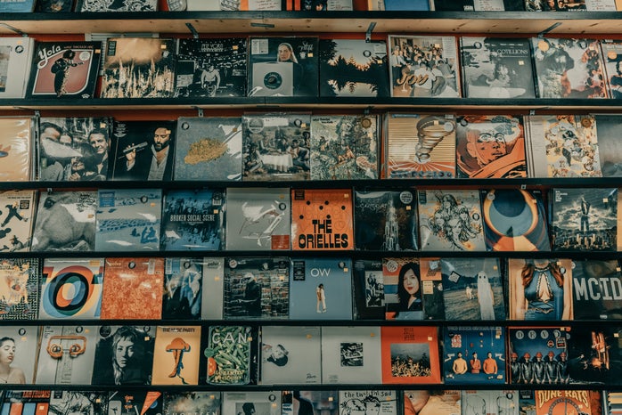 vinyl records on wall by Unsplash?width=698&height=466&fit=crop&auto=webp