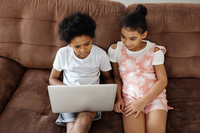 Two kids using a computer
