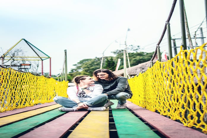 Woman And Man Sitting On Bridge 2872883?width=698&height=466&fit=crop&auto=webp