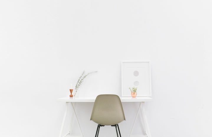 Beige And Black Chair In Front Of White Desk