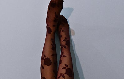 Photo Of Woman Wearing Floral Stockings