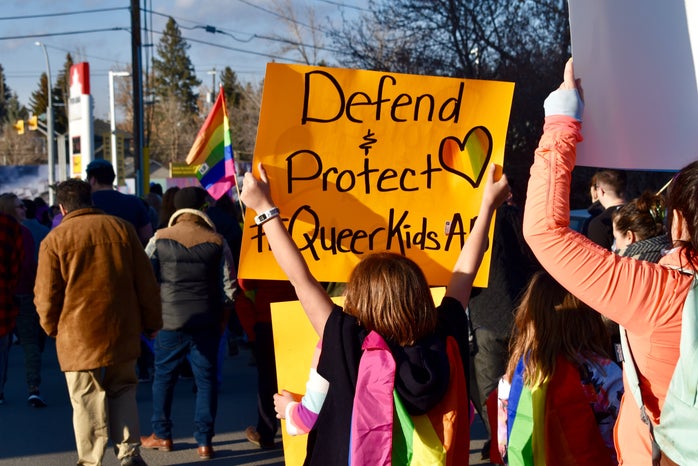 Pride parade Defend and Protect Queer Kids sign