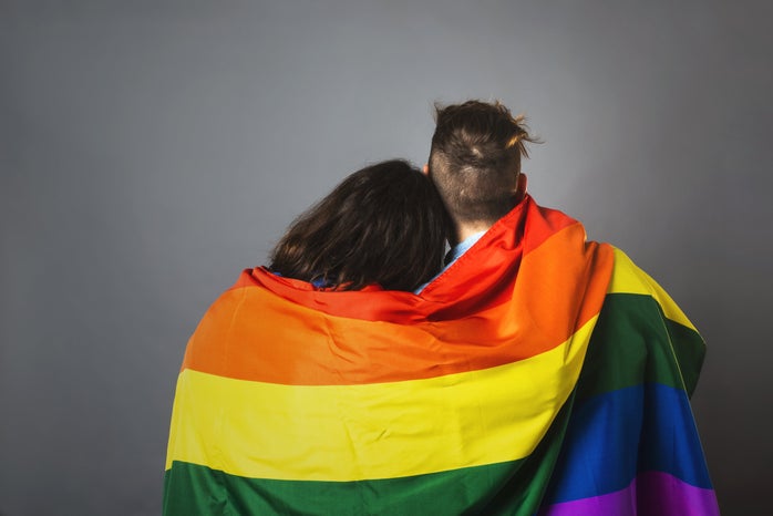 couplewrappedinprideflagjpg by Samantha Hurley from Burst?width=698&height=466&fit=crop&auto=webp