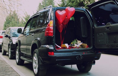 A car with a trunk set up for a valentine\'s date
