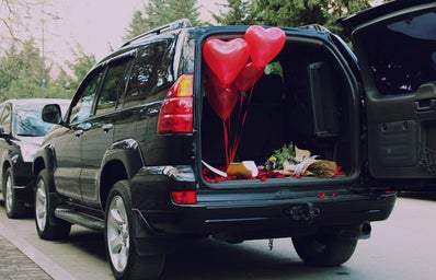 A car with a trunk set up for a valentine\'s date