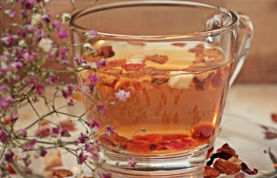 Breakfast tea with flowers and strawberries