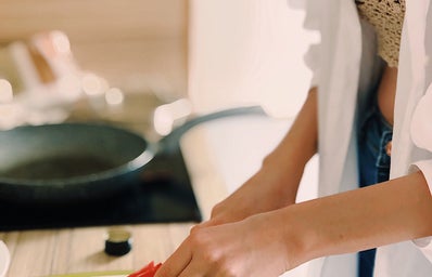 Woman slicing tomatoes
