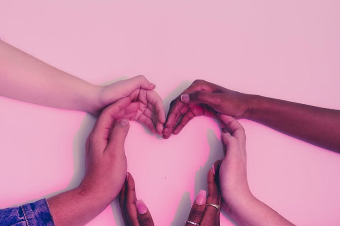 Hands forming the shape of a heart