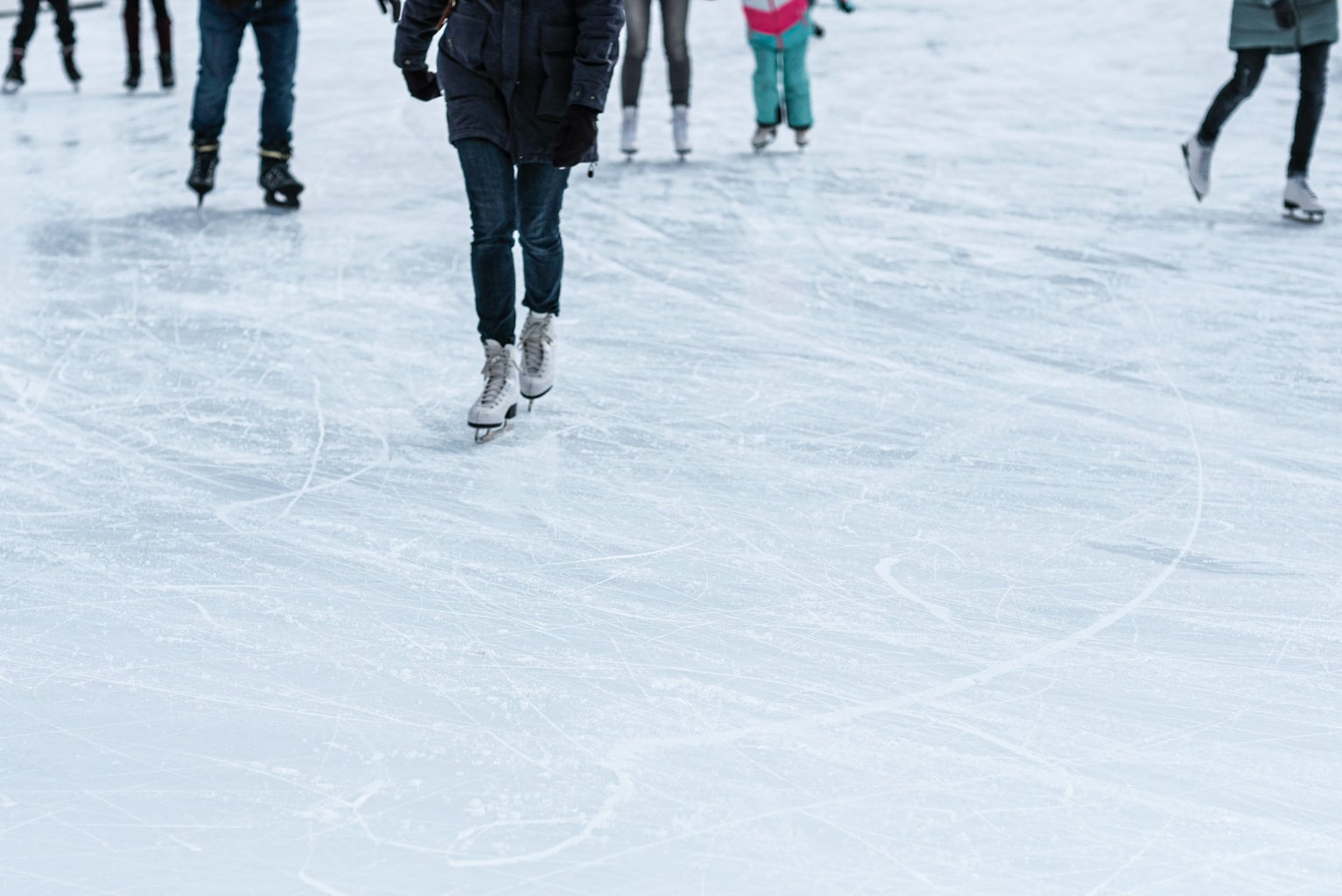 group of people ice skating