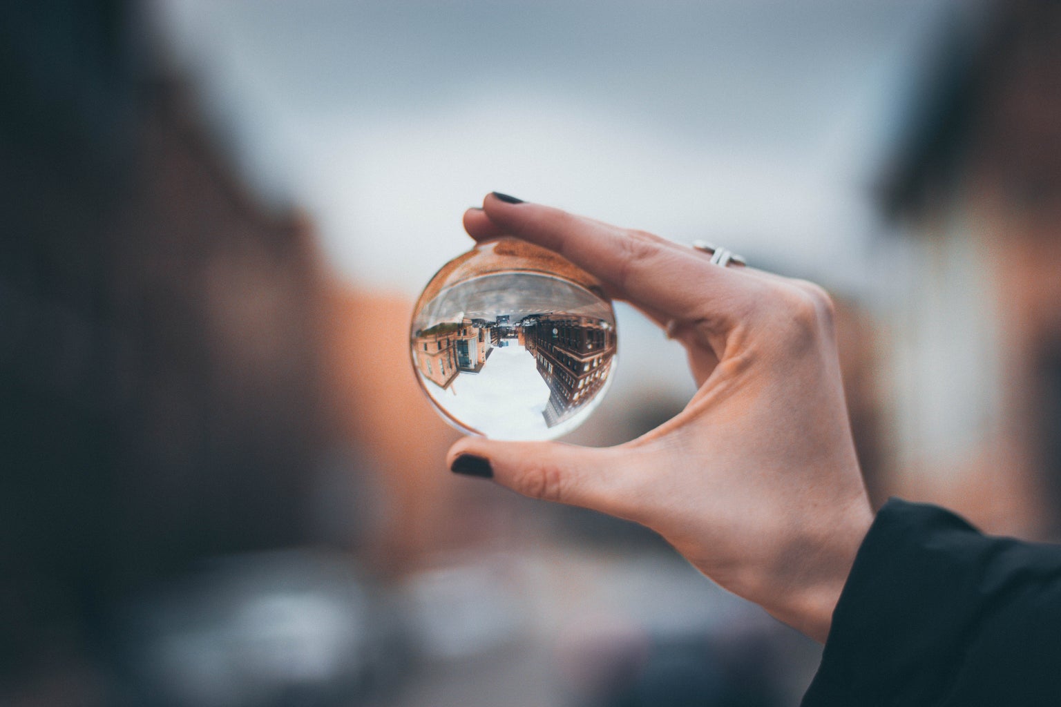 glass orb and city