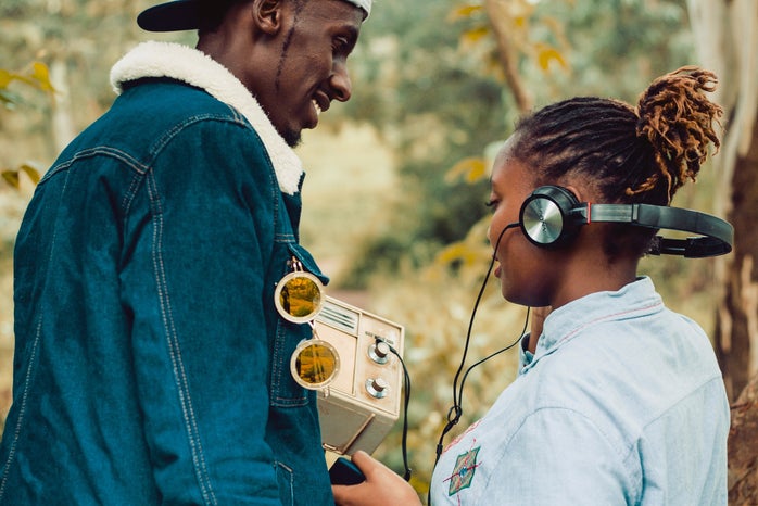 Two people listening to music