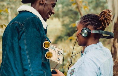 Two people listening to music