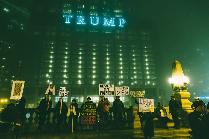 protestors at night outside of trump tower?width=698&height=466&fit=crop&auto=webp