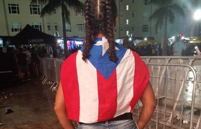 Gabriella Alexander with Puerto Rican flag cape