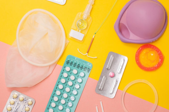 birth control methods against pink and yellow background