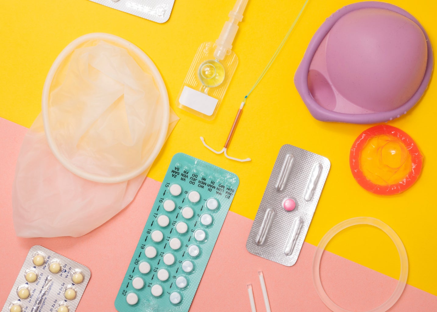 birth control methods against pink and yellow background