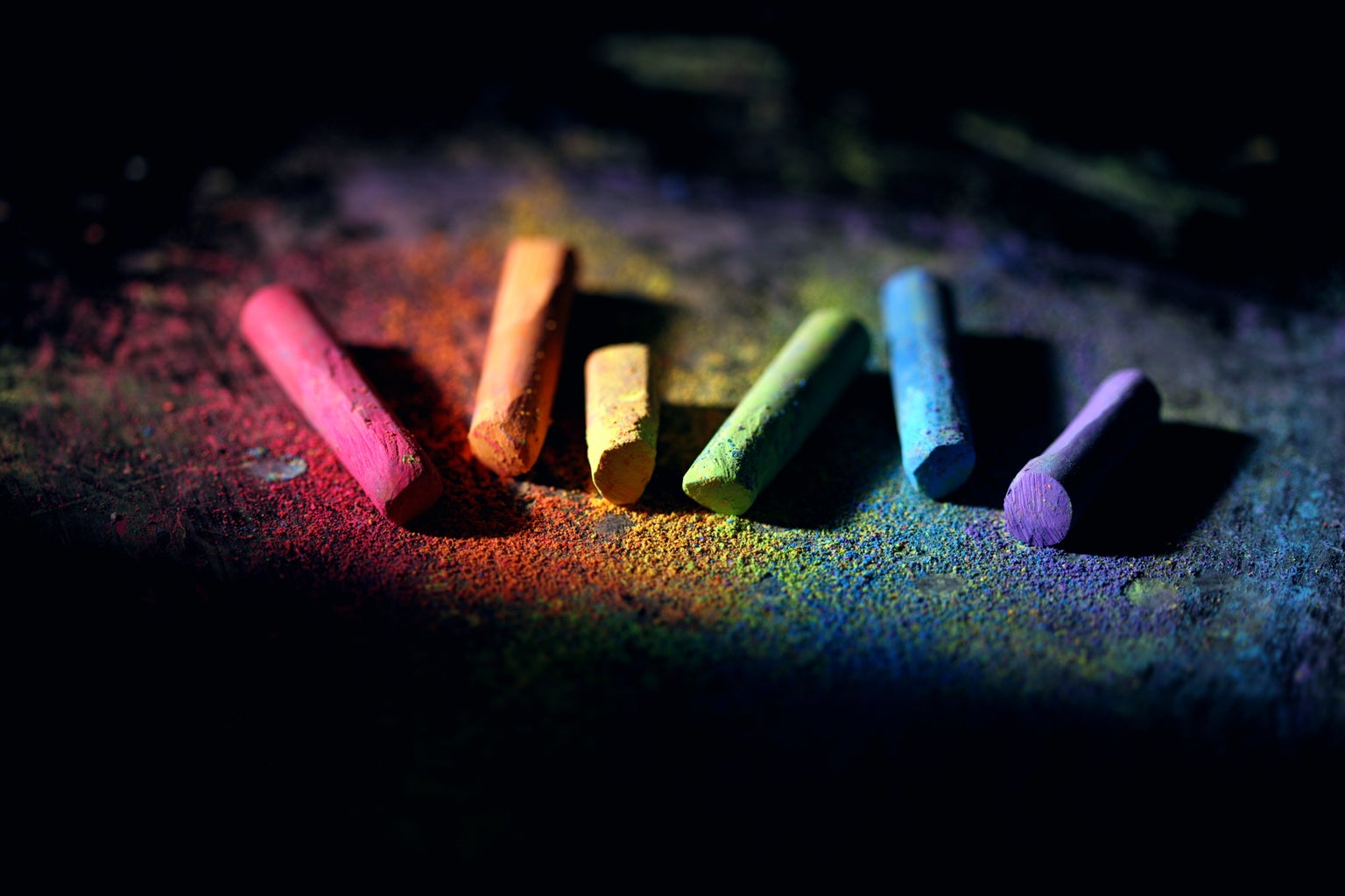 Rainbow chalk on black