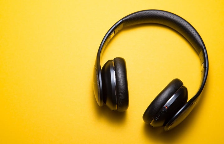 yellow background with headphones