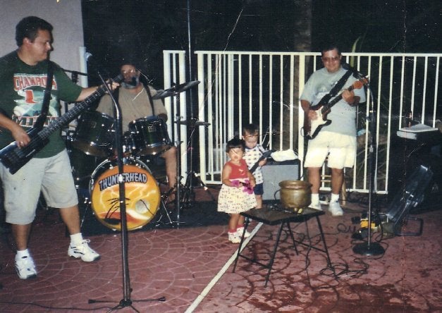 father with little kids on stage