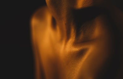 Zoomed in photo of a person\'s neck and clavicle area