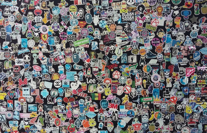 a bunch of stickers on a wall