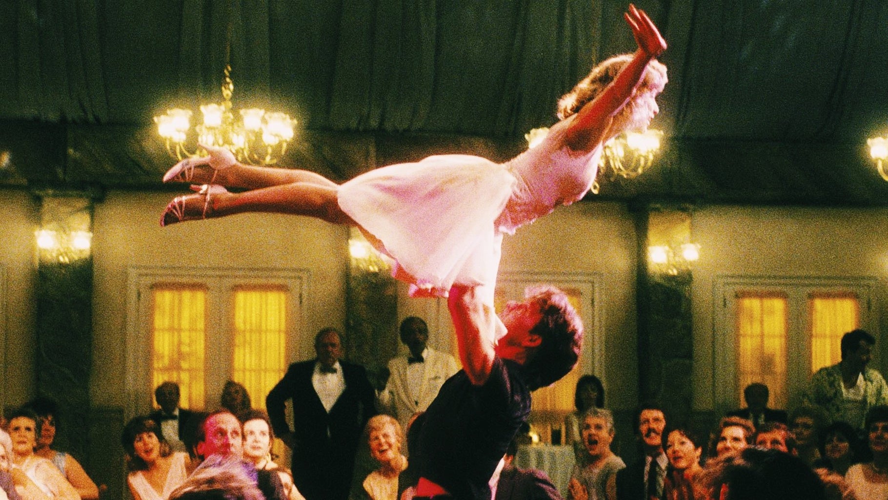 Patrick Swayze lifting up Jennifer Grey up in Dirty Dancing