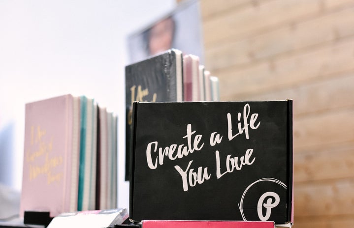 Notebook with \"create a life you love\" written on it