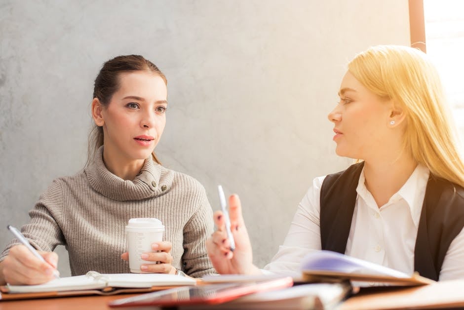 business women working together with coffee