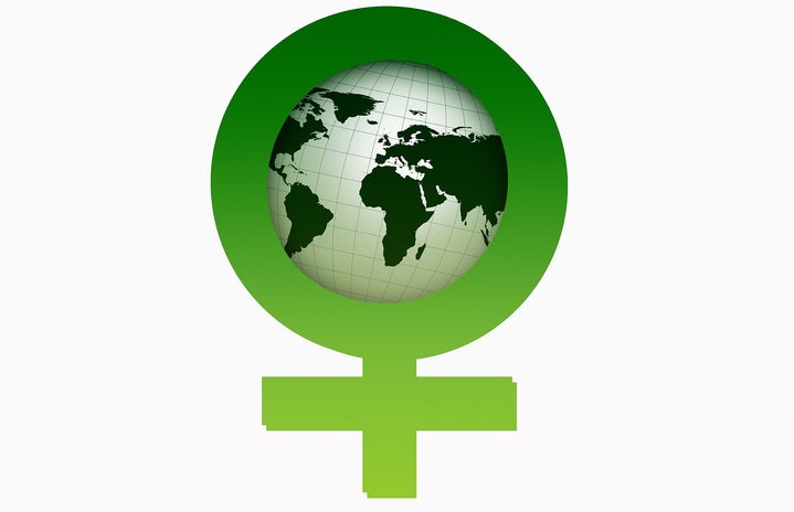 image of the globe inside a green female symbol