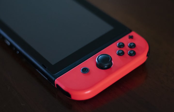 nindendo switch with a black background