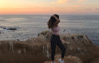 Kristin Ishaya - girl standing on cliff