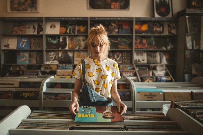 Girl looking at records