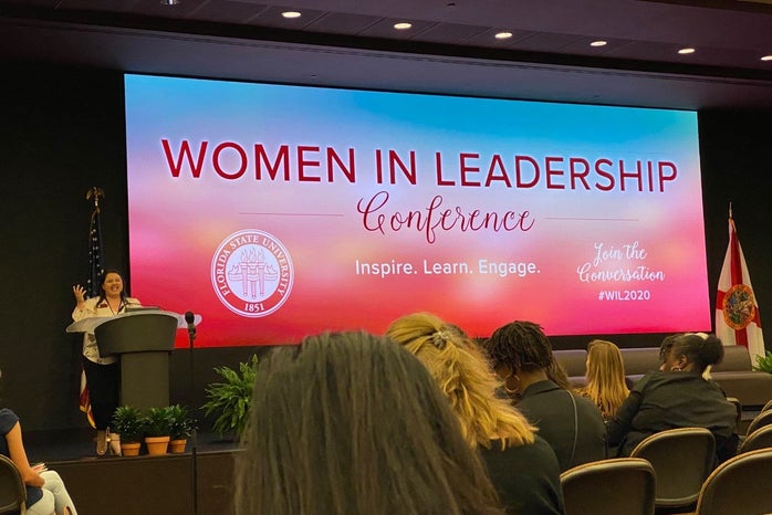 Women In Leadership on a big screen