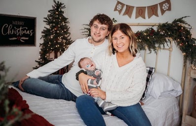 family with baby Christmas photo